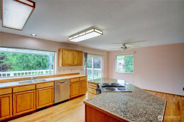 Kitchen is very large with and abundance of cabinetry and countertops Kitchen is very large with and abundance of cabinetry and countertops