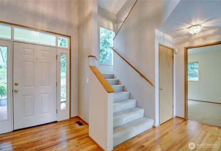 Front door, stairwell, more storage, and office/den Front door, stairwell, more storage, and office/den
