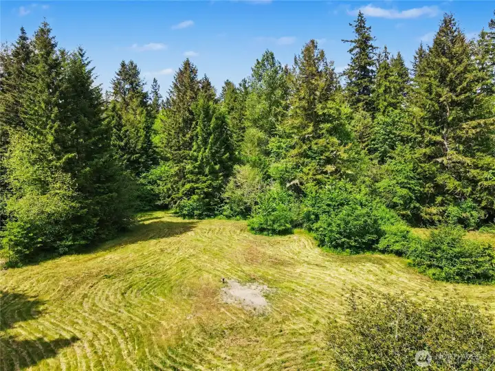 This gorgeous, riverside property on Wildwood Road is remote enough feel totally private, and yet it's just a quick drive from town.