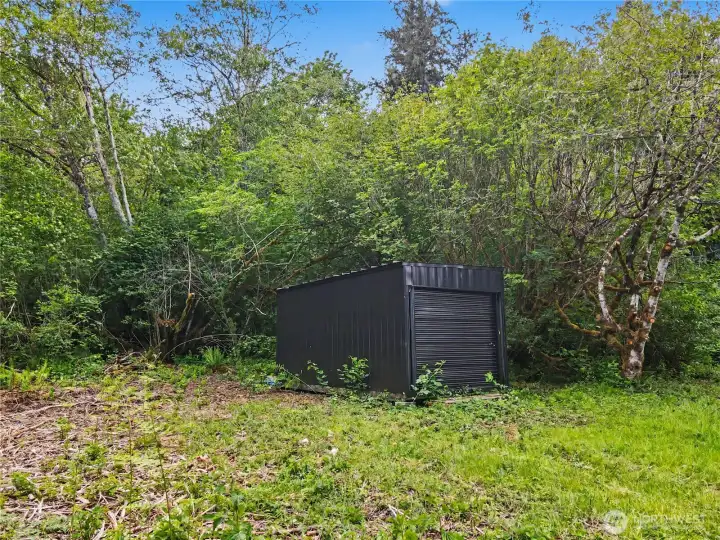 A storage shed has been built and will convey with the property.