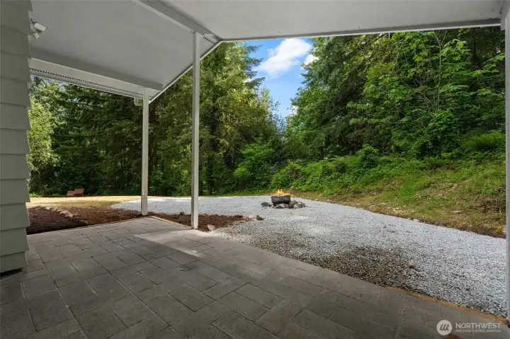 This is the patio off the dining room which is surrounded by nature This is the patio off the dining room which is surrounded by nature
