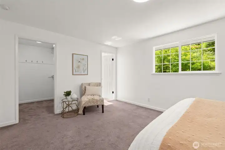 Primary suite with walk-in closet Primary suite with walk-in closet