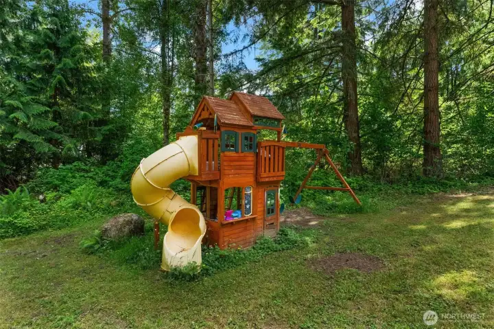 Playground area and lots of wooded trails to explore Playground area and lots of wooded trails to explore