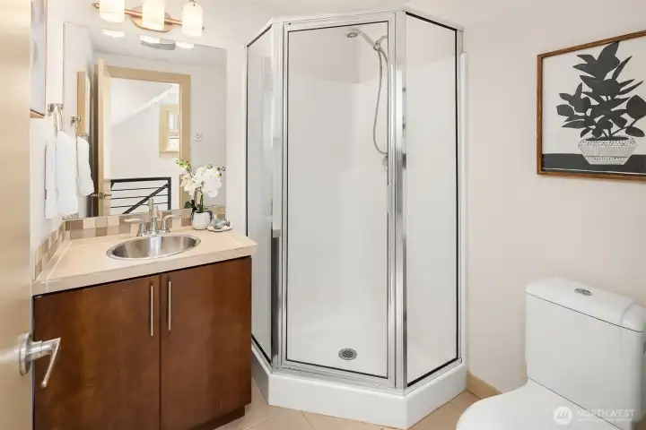 Serving the home's secondary bedrooms, this well-appointed bath offers comfort, convenience, and flexibility for everyday living.