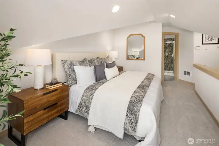 Occupying the entire upper level, the spacious owner's suite offers exceptional privacy, comfort, and a true retreat from the day.