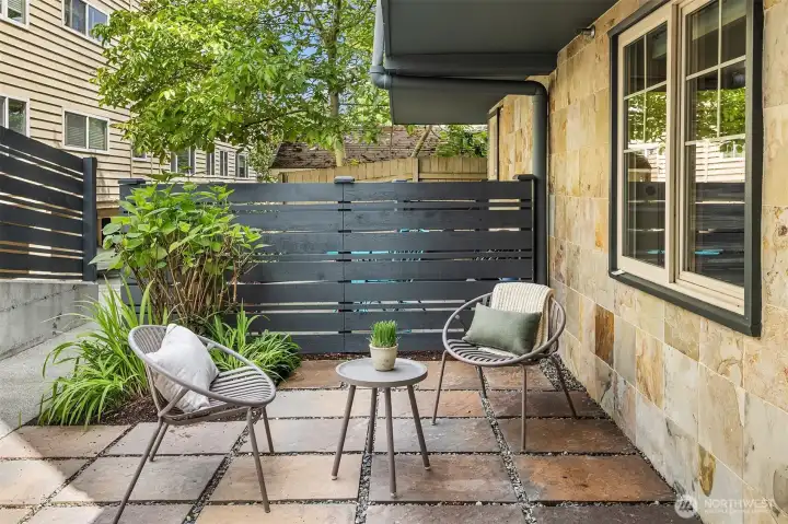 Enjoy a private, fenced patio—an inviting outdoor retreat for morning coffee, evening relaxation, or welcoming guests home.