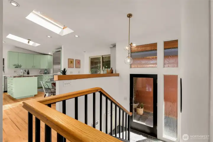 The updated kitchen is showered with light from the double skylights The updated kitchen is showered with light from the double skylights