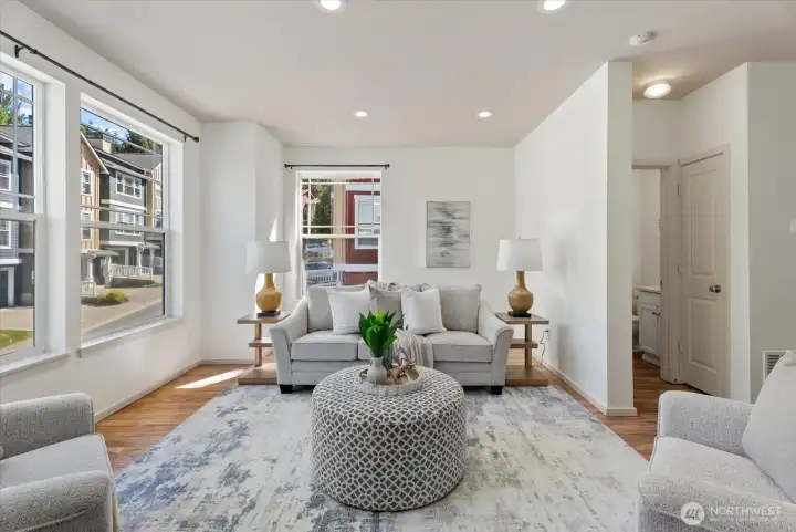 Light-filled living area with a practical, comfortable layout Light-filled living area with a practical, comfortable layout
