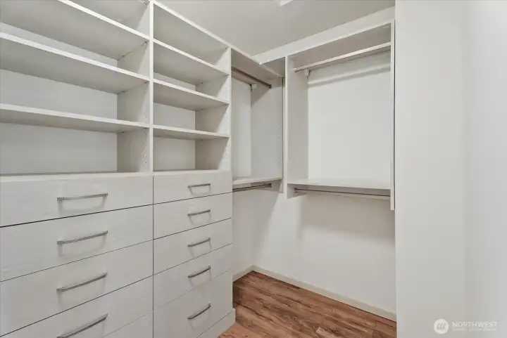 Primary suite with walk-in closet Primary suite with walk-in closet