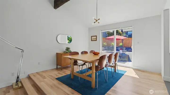 Designated dining room with access to the backyard.