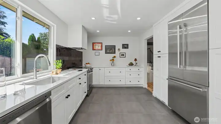 Enjoy new appliances, including a Thermador fridge.