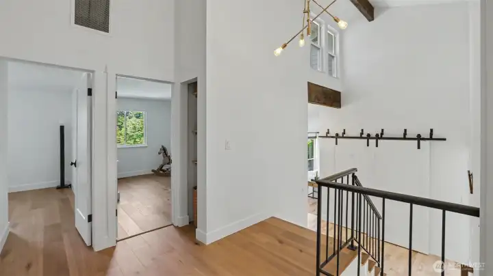 White oak engineered hardwood on the upper level.