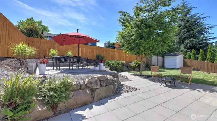 Step outside to the newly constructed upper terrace and brand-new fencing!