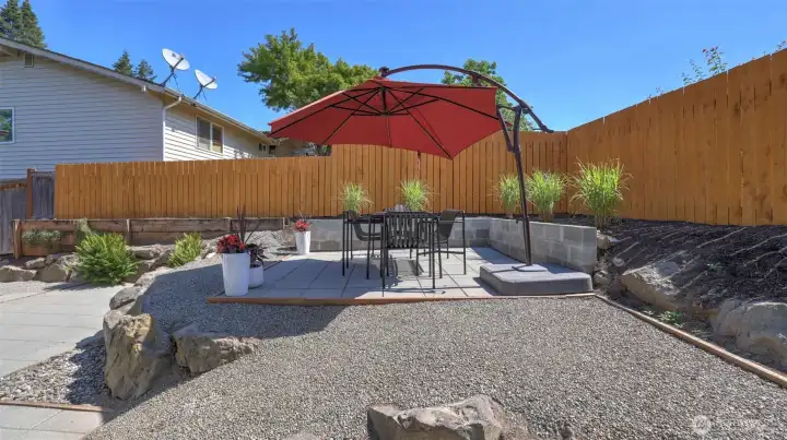 Brand new upper terrace creates the perfect setting for outdoor dining, entertaining, or simply enjoying the privacy of the fully fenced backyard.
