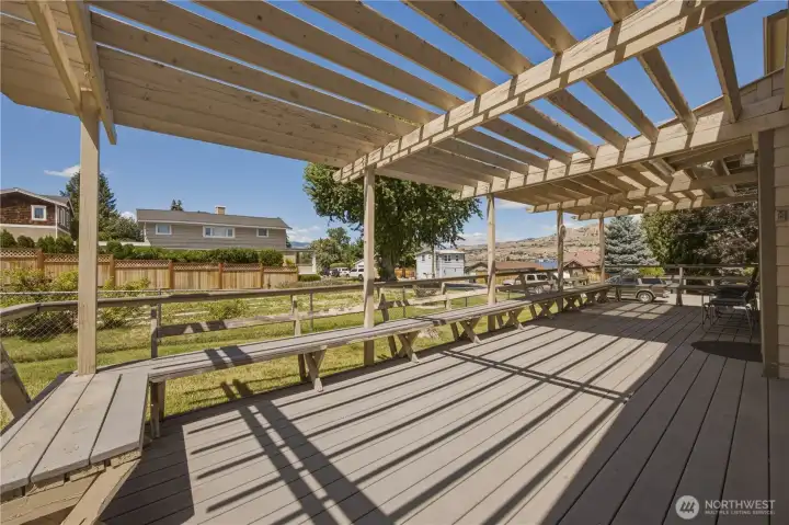 Side Porch off Kitchen with Access Ramp to Garage.