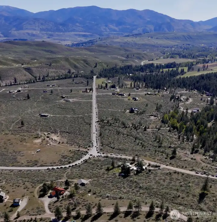 Aerial, looking east towards Winthrop, Sunflower relay race happening,  lot 10 bottom right of image.