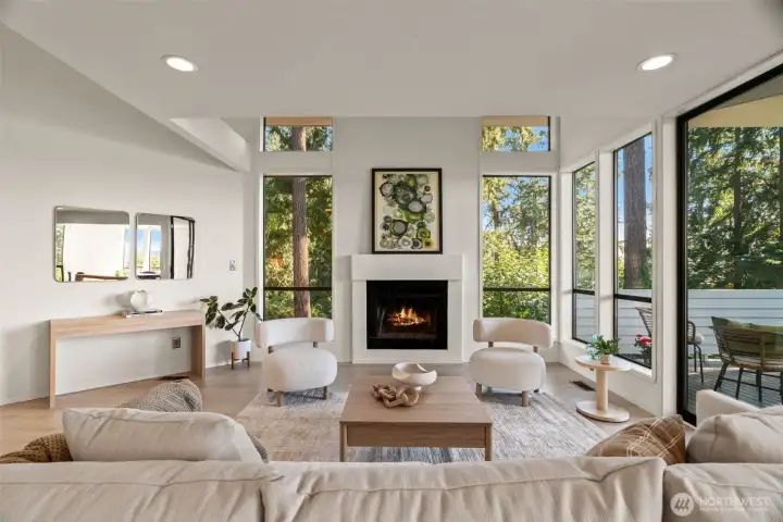 Large windows and new flooring throughout Large windows and new flooring throughout