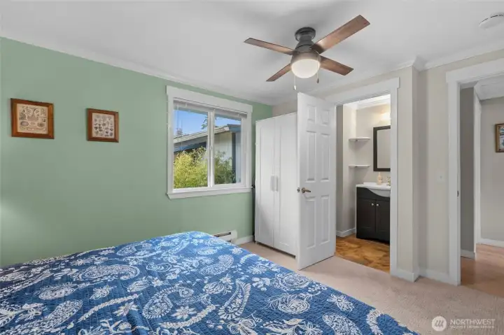 Primary bedroom with 1/2 bath. Primary bedroom with 1/2 bath.