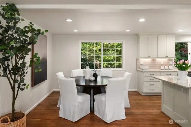Generous dining area with recessed lighting.