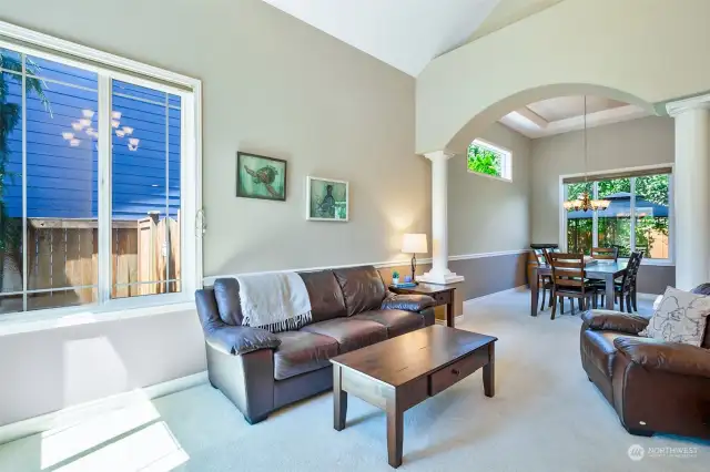 Bright living room with vaulted ceilings