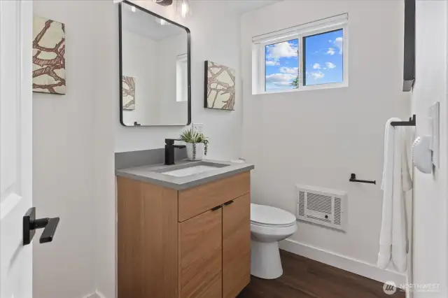 Convenient downstairs 1/2 bathroom.