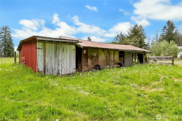 27x40 Barn. Was a chicken coop =. Used for wood, lumber, hay, cows. Shed on left side was used for tractor storage.