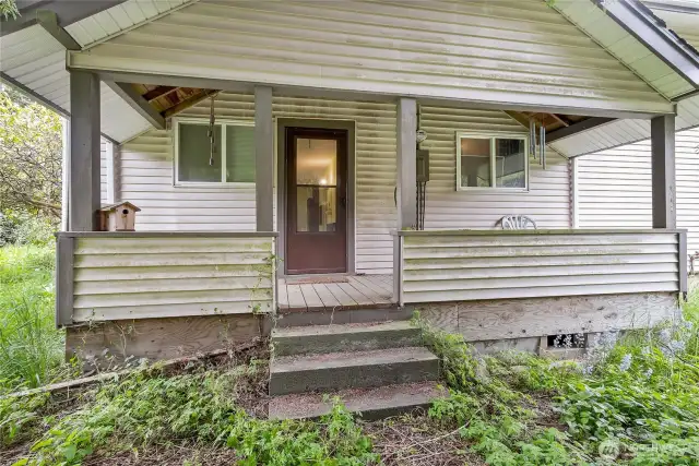 Front porch of home, facing 224th