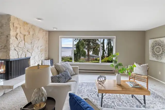 The living room is so open and spacious. You can see a bit more of the beautiful fireplace here...