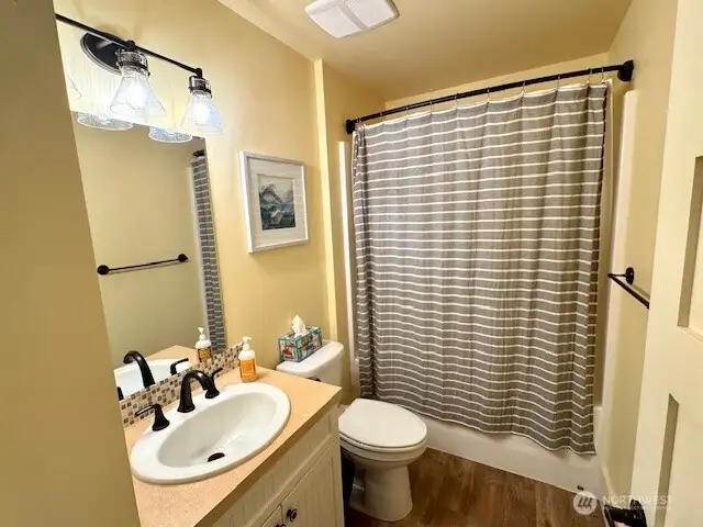 Hall bath on upper floor.