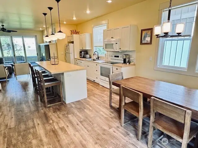 Main level offers open floorplan with Island Kitchen.