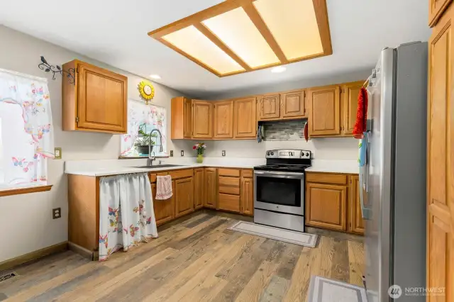 Brand new quartz counter tops, newer appliances & tons of storage!