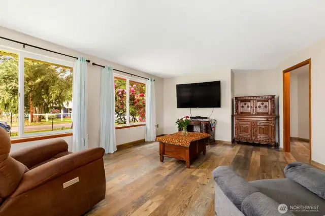 Notice the brand new engineered hardwood flooring & fresh paint!