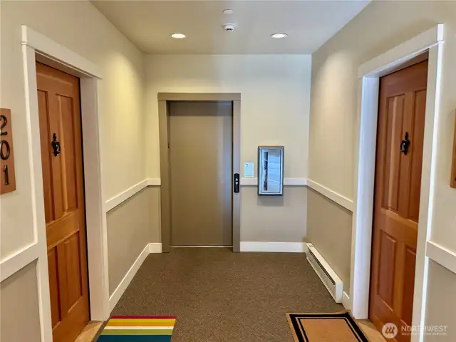 There are no shared walls. The home has a secure lobby and elevator from the front door to the parking garage and storage closet.