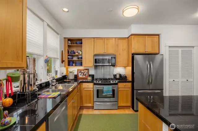 The kitchen has a dual fuel (propane stove top and electric oven) range.