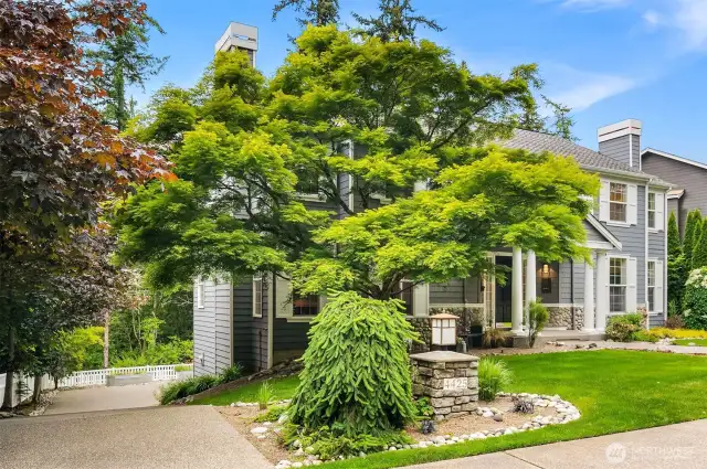 Spacious three-car garage tucked neatly behind the home.