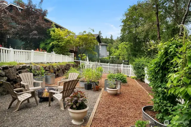 A charming garden space made even more special with a trail of hazelnut shells.