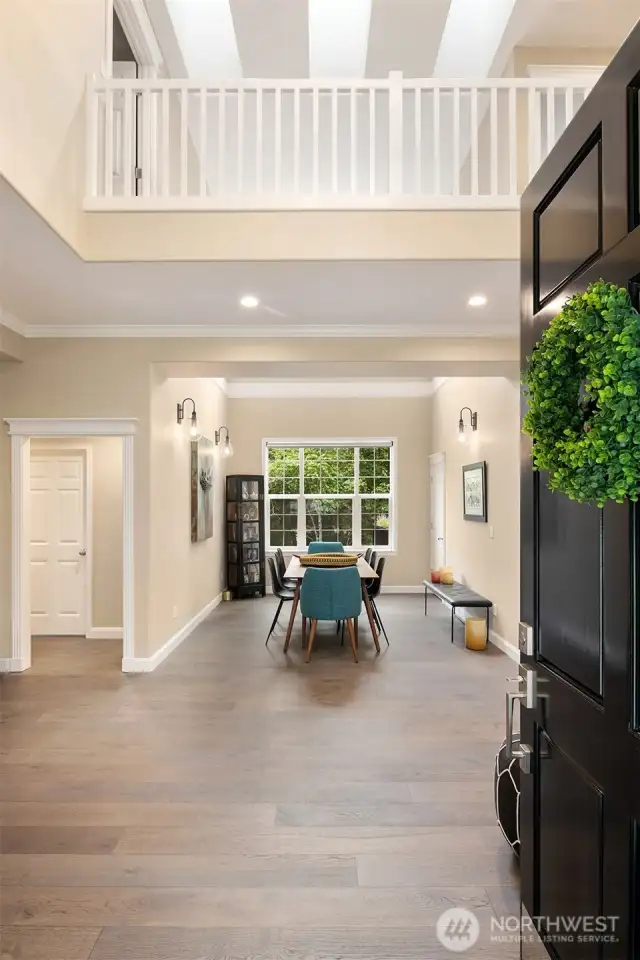 Gorgeous, engineered hardwoods from Overland Flooring span the entire main level.