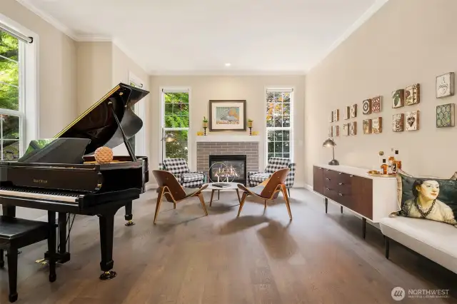 The living room offers an intimate setting for conversations and concerts alike.