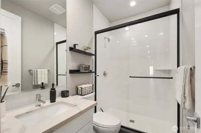 Downstairs bathroom between guest bedroom and office.