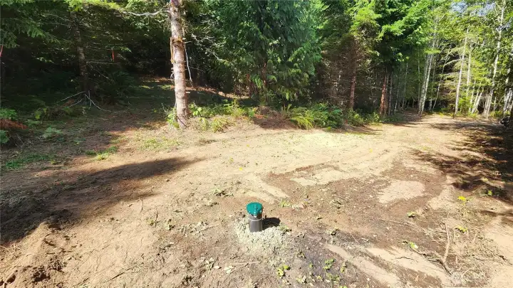 Well is 98' deep and provides 30 gallons per minute.