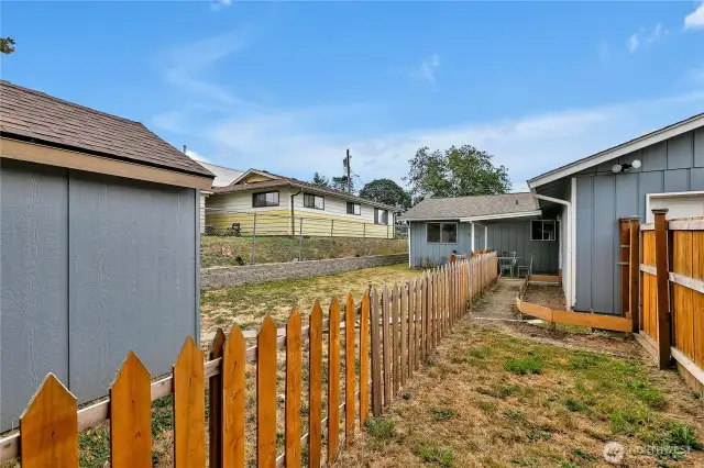 View from back of lot, newer fencing on right.