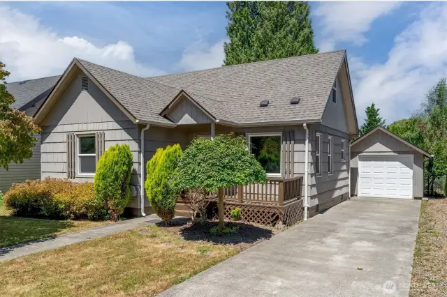 Front of home with extra deep driveway