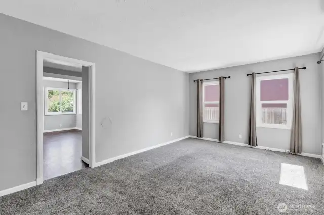 Living room with wall to wall carpeting