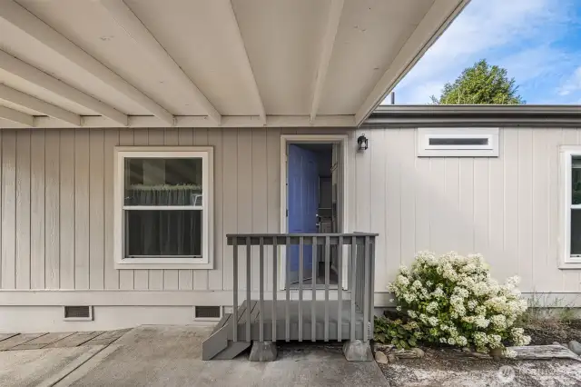 Access to home from the south side under the carport.