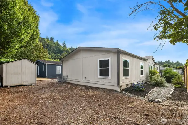 Large, level and fenced back yard.