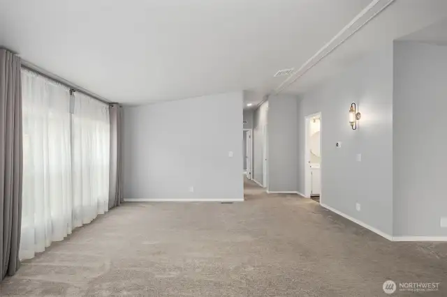 This home features new fixtures, carpet, draperies and flooring.