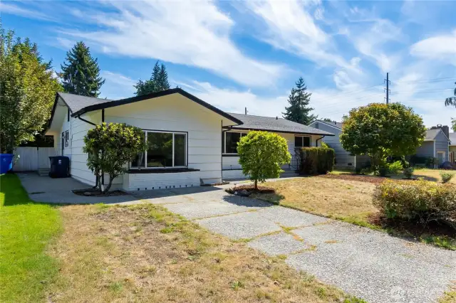 Driveway parking and separate entrance on the left