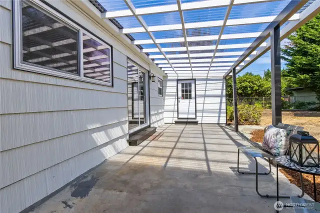 Grand covered porch perfect for entertaining in any weather