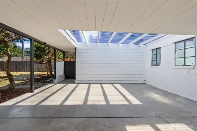 Grand covered porch perfect for entertaining in any weather