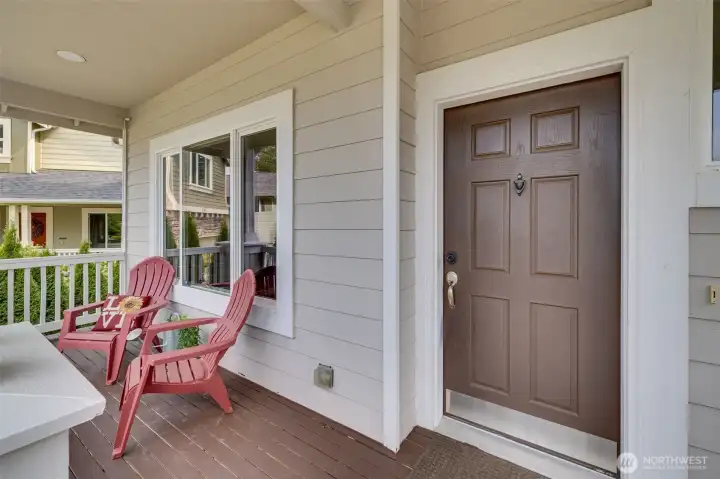 Relaxing front porch in a friendly neighborhood with wonderful territorial and sunset views.